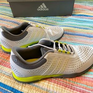 Adidas women’s golf shoes. Size 7 1/2. Only wore a couple of times.